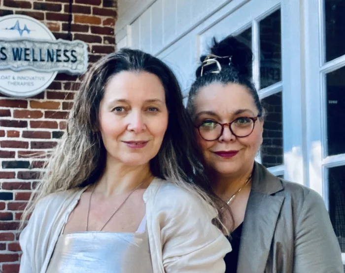 Rita and Nola, sisters and co-founders of Epiros Wellness, outside the Epiros Wellness storefront